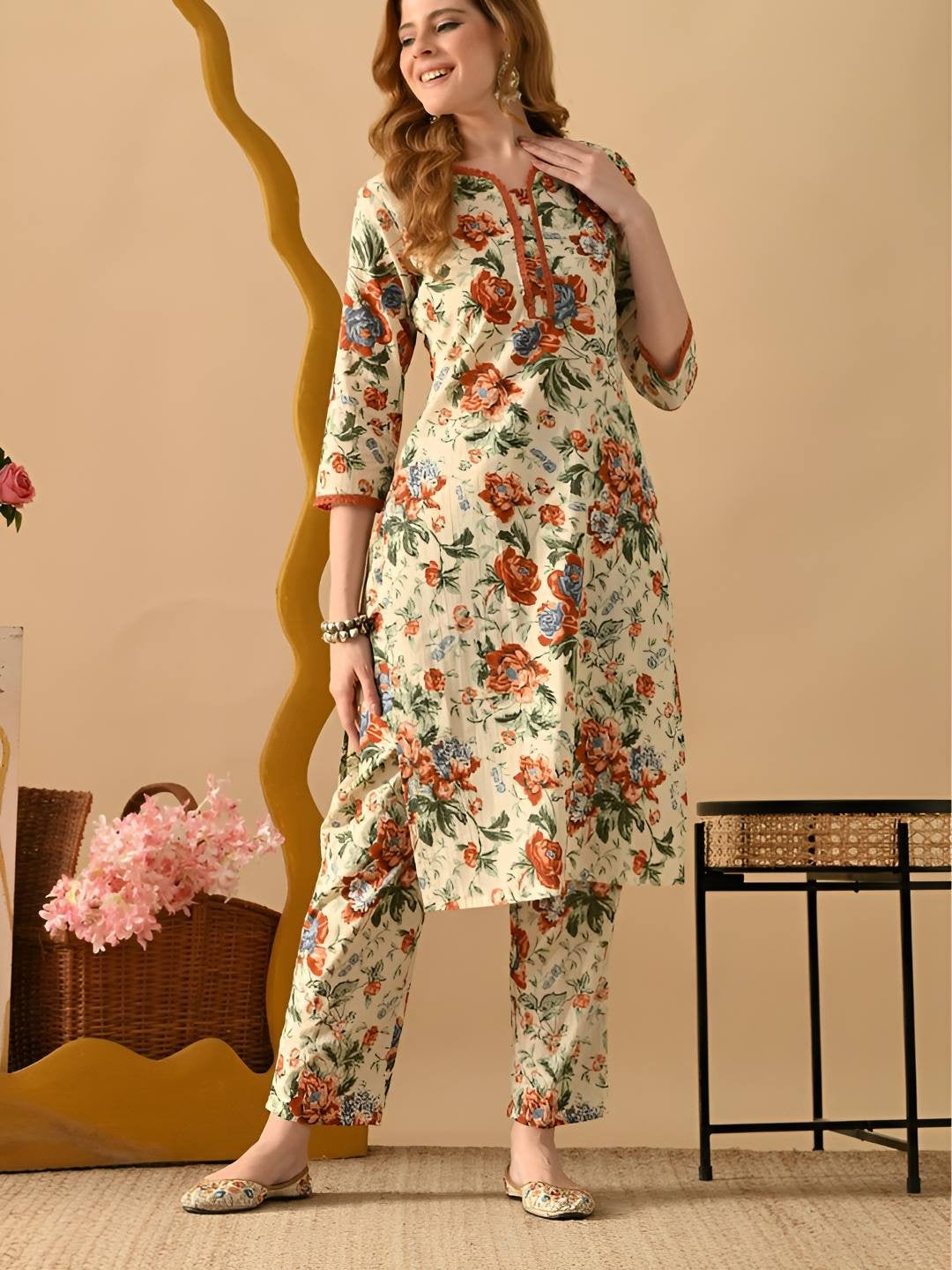 Women Floral Printed Cotton Kurta with Trousers