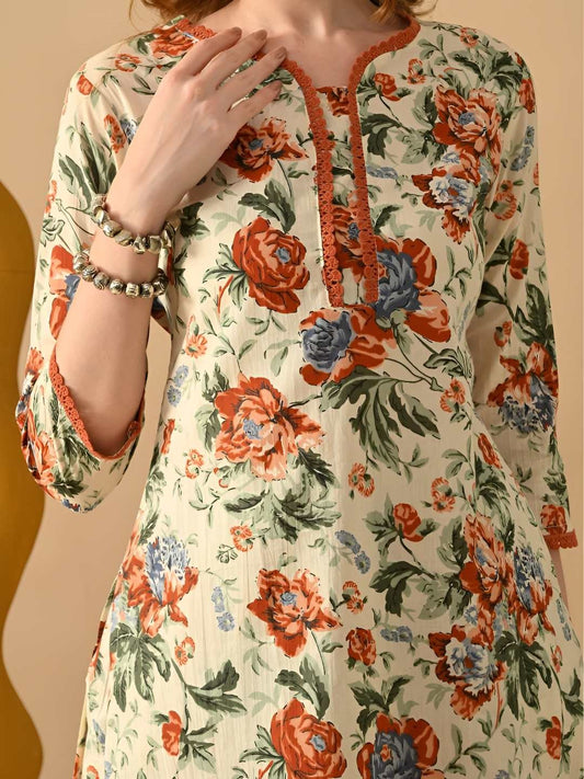 Women Floral Printed Cotton Kurta with Trousers