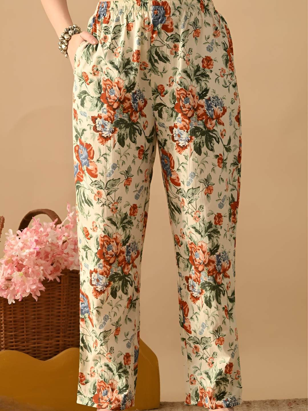 Women Floral Printed Cotton Kurta with Trousers