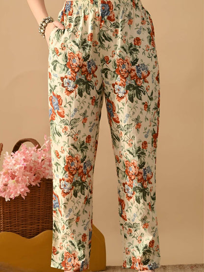 Women Floral Printed Cotton Kurta with Trousers