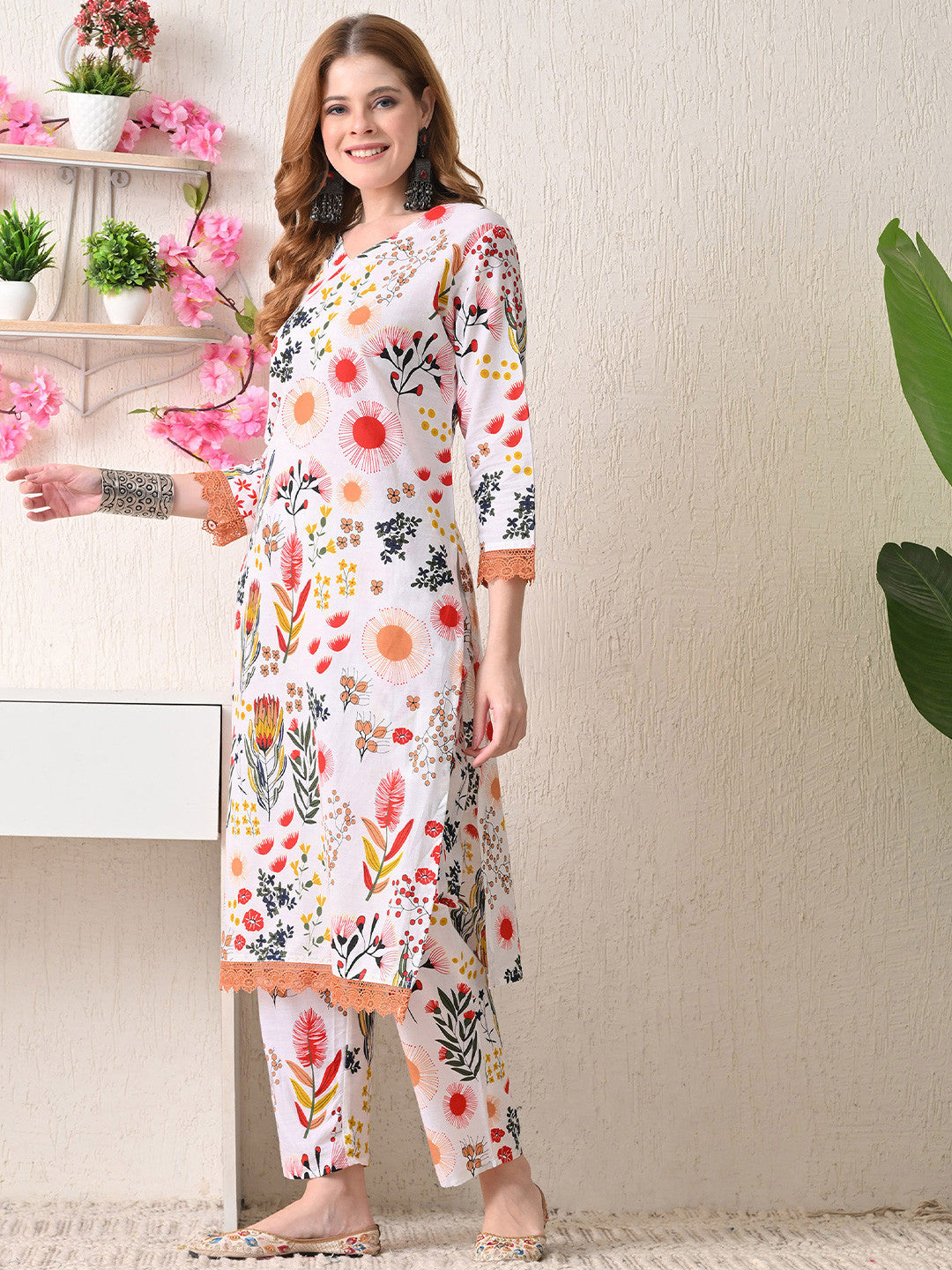 Women Floral Printed Cotton Kurta with Trousers