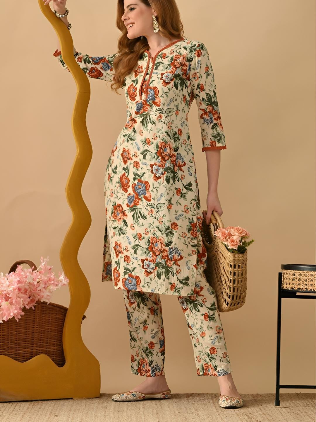 Women Floral Printed Cotton Kurta with Trousers
